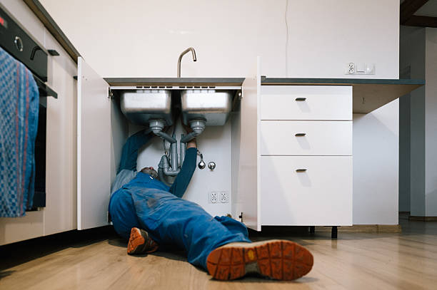Professional Drain Cleaning technician working in Del Valle, TX